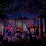 Band on stage performing